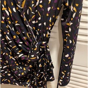 Black blouse with multi colored accents. Made by Black label size M